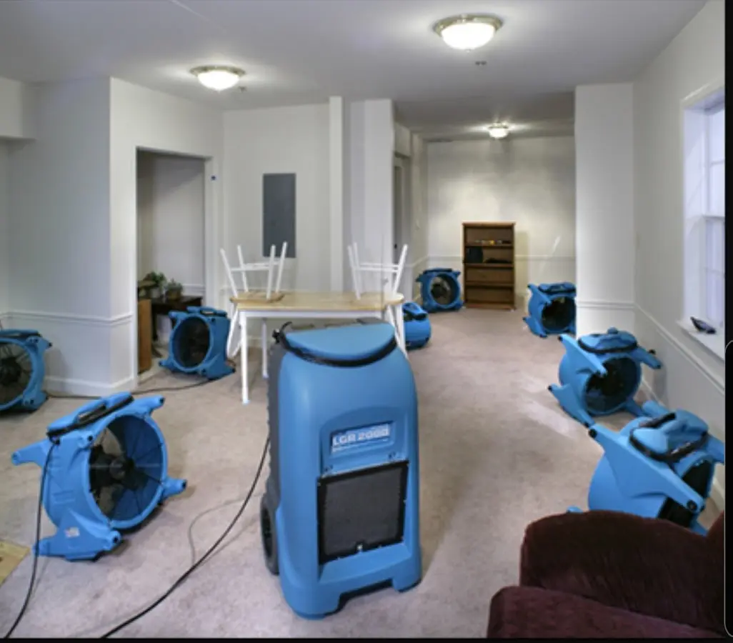 Air movers and dehumidifier setup for Water Damage Restoration in Lennox